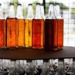 Com tarifaço, Governo do Ceará vai comprar cajuína para usar na alimentação de escolas e hospitais